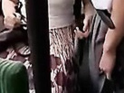 Japanese whore playing naughty on the bus