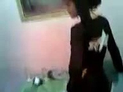 Arab girl at table flashes her tits