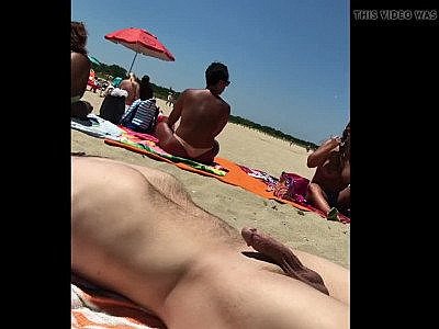 Cumming on the beach in front of naked woman (not mine)