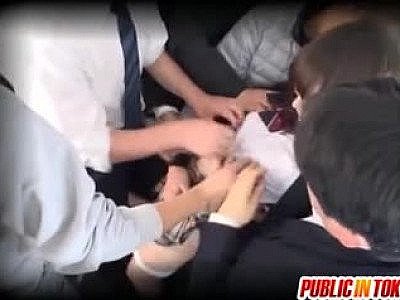 Pretty Asian young girl in school uniform