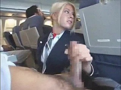 Stewardess sucking penis on a plane
