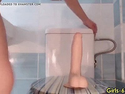 Stepsister riding her dildo in the bathroom