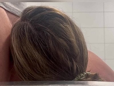 Fellatio close up from sexy Milf with massive tits in a public bathroom